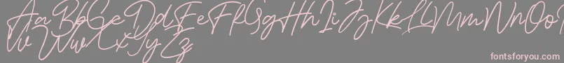 Bessita Handwriting Free Font – Pink Fonts on Gray Background