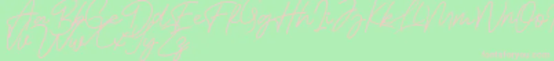 Bessita Handwriting Free-fontti – vaaleanpunaiset fontit vihreällä taustalla