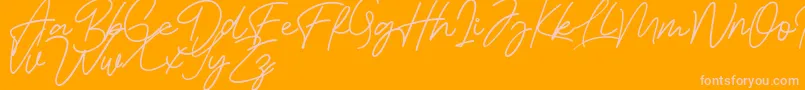 Czcionka Bessita Handwriting Free – różowe czcionki na pomarańczowym tle