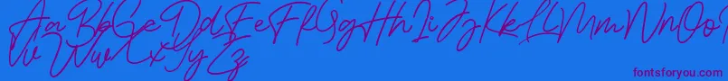 Czcionka Bessita Handwriting Free – fioletowe czcionki na niebieskim tle