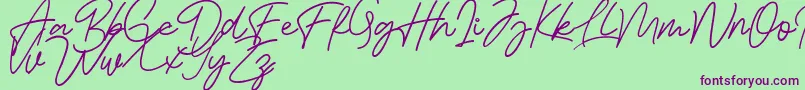 Bessita Handwriting Free-Schriftart – Violette Schriften auf grünem Hintergrund