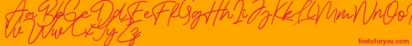 Bessita Handwriting Free-Schriftart – Rote Schriften auf orangefarbenem Hintergrund