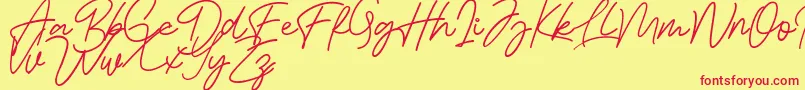 Bessita Handwriting Free Font – Red Fonts on Yellow Background