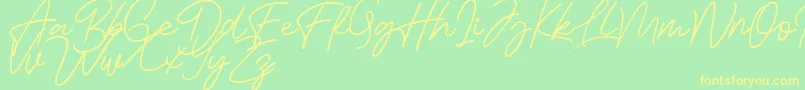Шрифт Bessita Handwriting Free – жёлтые шрифты на зелёном фоне