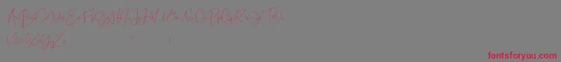 Best Deals Font – Red Fonts on Gray Background
