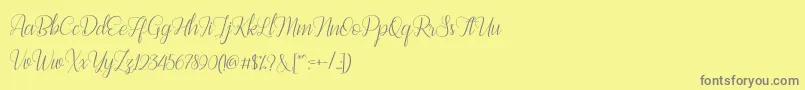 Bestilla Script DEMO-Schriftart – Graue Schriften auf gelbem Hintergrund