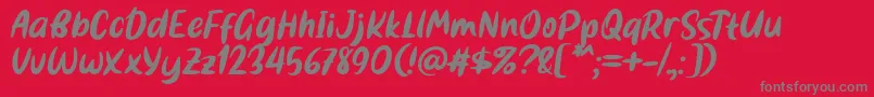 フォントBestina Font by 7NTypes – 赤い背景に灰色の文字