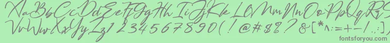 Bestowens Font – Gray Fonts on Green Background