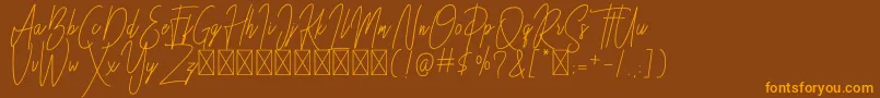 Besttones Regular DEMO Font – Orange Fonts on Brown Background