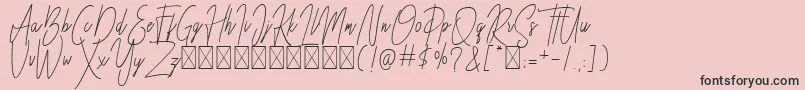 フォントBesttones Regular DEMO – ピンクの背景に黒い文字