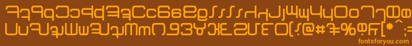 フォントBetazed – オレンジ色の文字が茶色の背景にあります。