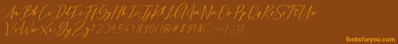 Bethany Script Dafont-Schriftart – Orangefarbene Schriften auf braunem Hintergrund