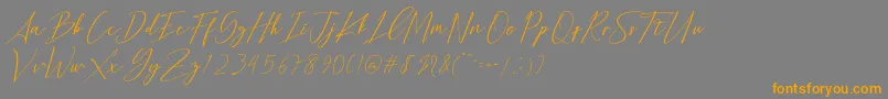 Bethany Script Dafont-fontti – oranssit fontit harmaalla taustalla