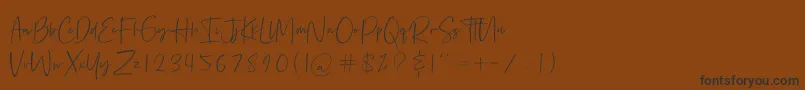 Bethoven Font – Black Fonts on Brown Background