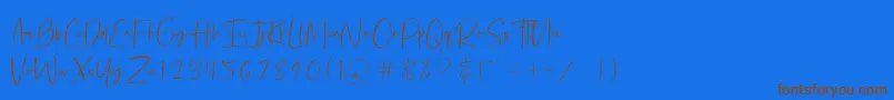Czcionka Bethoven – brązowe czcionki na niebieskim tle