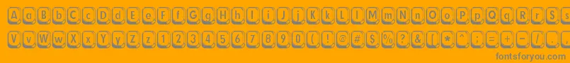 betsy flanagan-Schriftart – Graue Schriften auf orangefarbenem Hintergrund