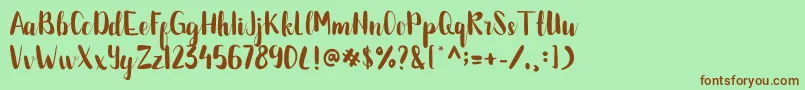 BETTALIA Font – Brown Fonts on Green Background