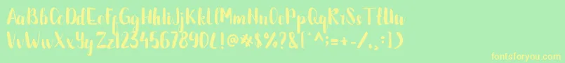 BETTALIA Font – Yellow Fonts on Green Background