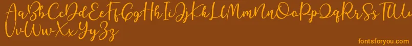 Better Caramel Font – Orange Fonts on Brown Background
