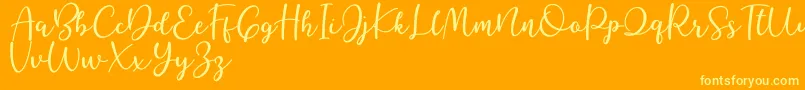 Better Caramel Font – Yellow Fonts on Orange Background