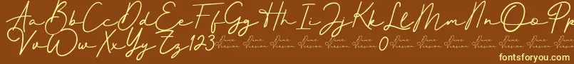 フォントBetter Signature Font – 黄色のフォント、茶色の背景