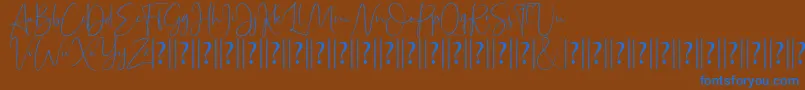 Bettrish Dafont Font – Blue Fonts on Brown Background