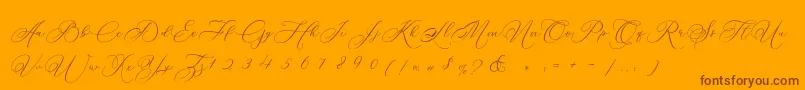fuente Betty Laudia Script – Fuentes Marrones Sobre Fondo Naranja