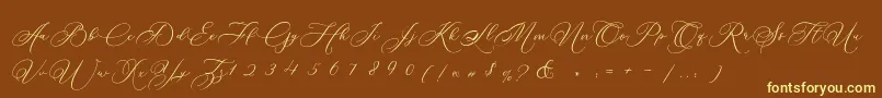 Betty Laudia Script-Schriftart – Gelbe Schriften auf braunem Hintergrund