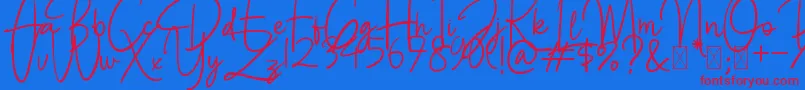 BettyLavea Font – Red Fonts on Blue Background