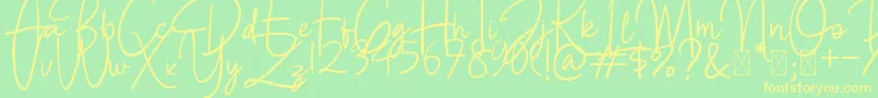 BettyLavea Font – Yellow Fonts on Green Background
