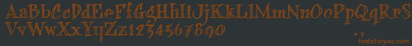 Шрифт BFONDTRIAL – коричневые шрифты на чёрном фоне