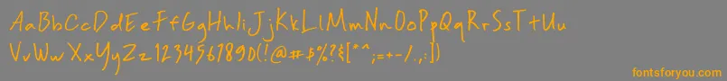 フォントBiasa – オレンジの文字は灰色の背景にあります。