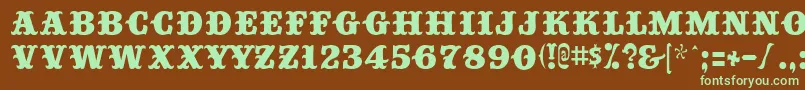 フォントBig Top – 緑色の文字が茶色の背景にあります。