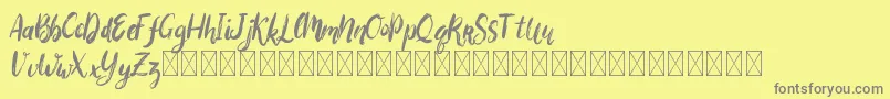 フォントBigarus – 黄色の背景に灰色の文字