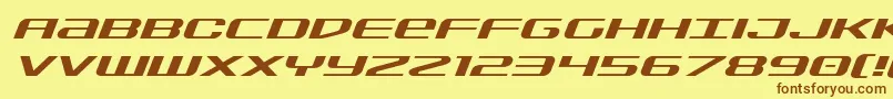 フォントSdfexpandital – 茶色の文字が黄色の背景にあります。