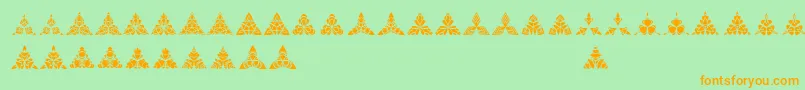 BIGILIW Patterns Font – Orange Fonts on Green Background