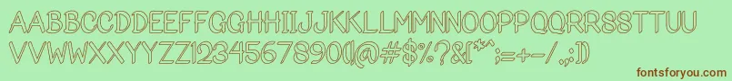 Bigoutliner Font – Brown Fonts on Green Background