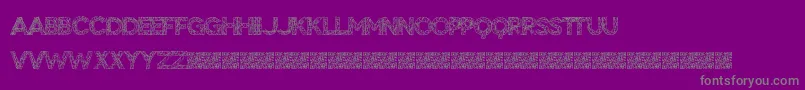 フォントBigTangle – 紫の背景に灰色の文字