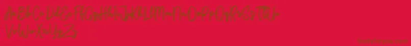 Bikarosta Script-fontti – ruskeat fontit punaisella taustalla