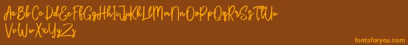 Bikarosta Script-Schriftart – Orangefarbene Schriften auf braunem Hintergrund