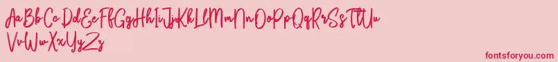 Bikarosta Script Font – Red Fonts on Pink Background