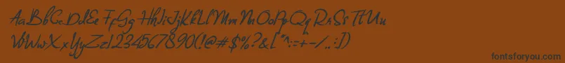 フォントBillea Quin 1 – 黒い文字が茶色の背景にあります