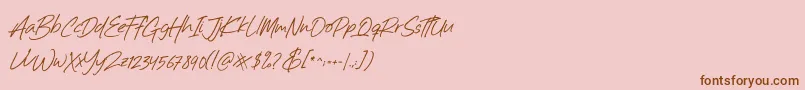 Billistone-Schriftart – Braune Schriften auf rosa Hintergrund