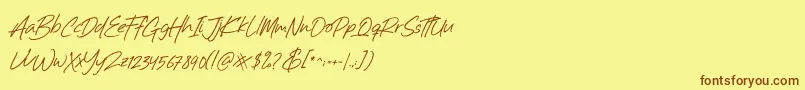 Billistone-Schriftart – Braune Schriften auf gelbem Hintergrund