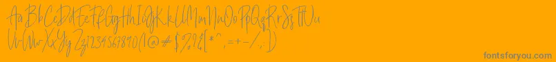 Billystuck-Schriftart – Graue Schriften auf orangefarbenem Hintergrund