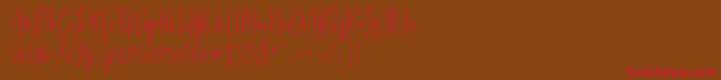 Billystuck-Schriftart – Rote Schriften auf braunem Hintergrund