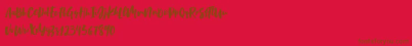 Birabella Script-fontti – ruskeat fontit punaisella taustalla