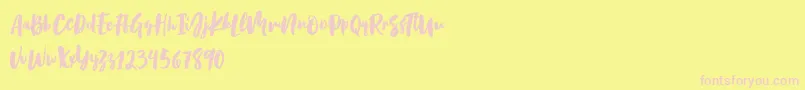 Fonte Birabella Script – fontes rosa em um fundo amarelo