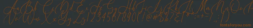 Шрифт Birallina – коричневые шрифты на чёрном фоне