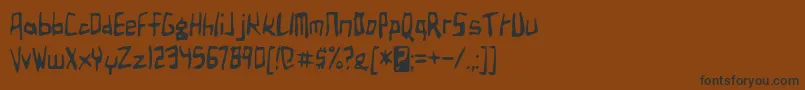 フォントbirdland aeroplane – 黒い文字が茶色の背景にあります